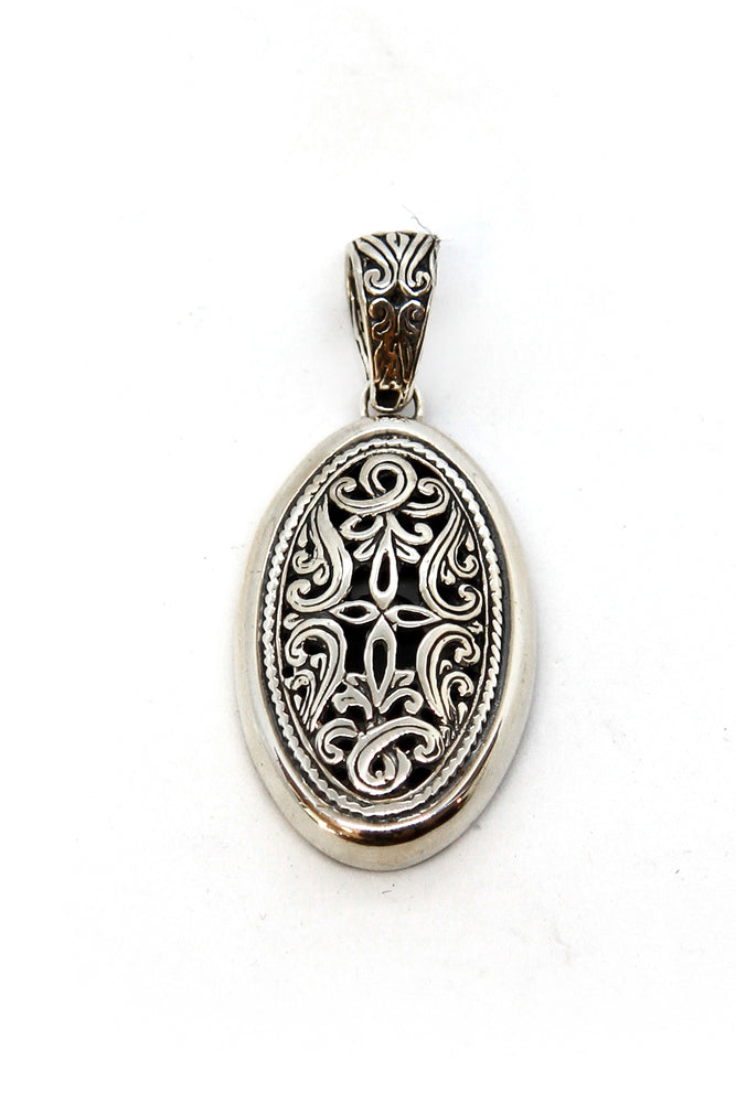 Silver cut out pendant