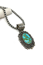 Kingman Turquoise Pendant by Navajo artist Rosita Calladitto