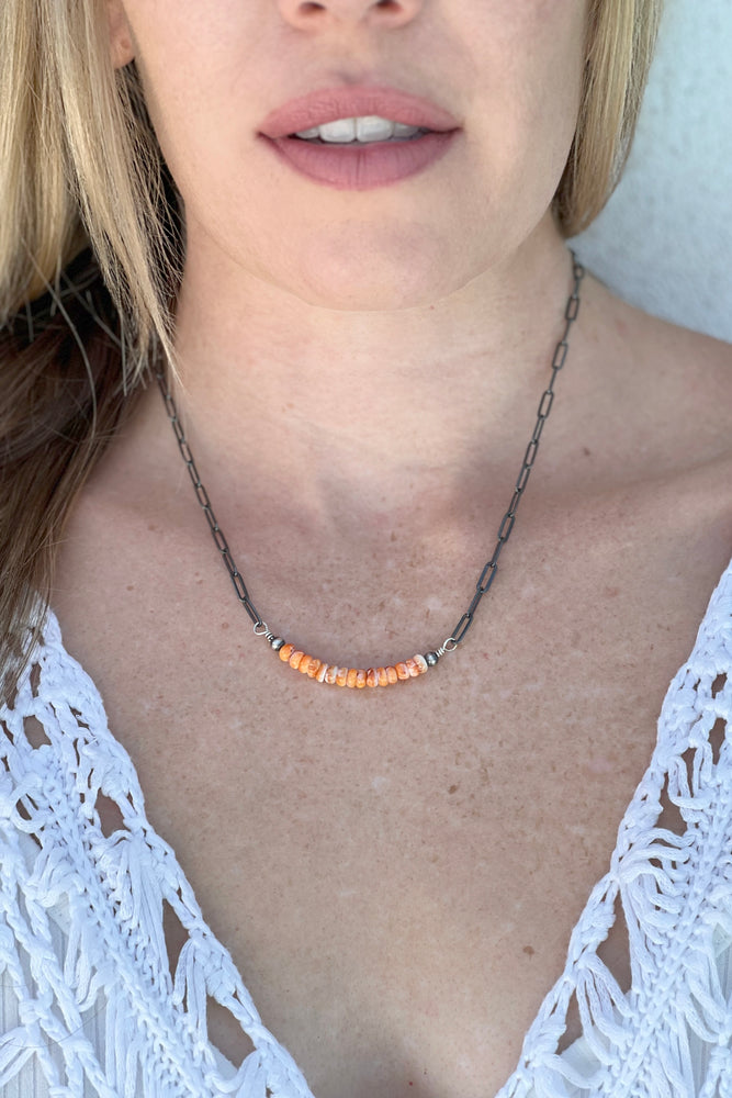 
                
                    Load image into Gallery viewer, Oxidized Sterling Silver and Orange Spiny Shell Bead Necklace
                
            