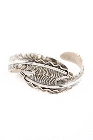 
                
                    Load image into Gallery viewer, Navajo Double Feather Sterling Silver Cuff Bracelet
                
            
