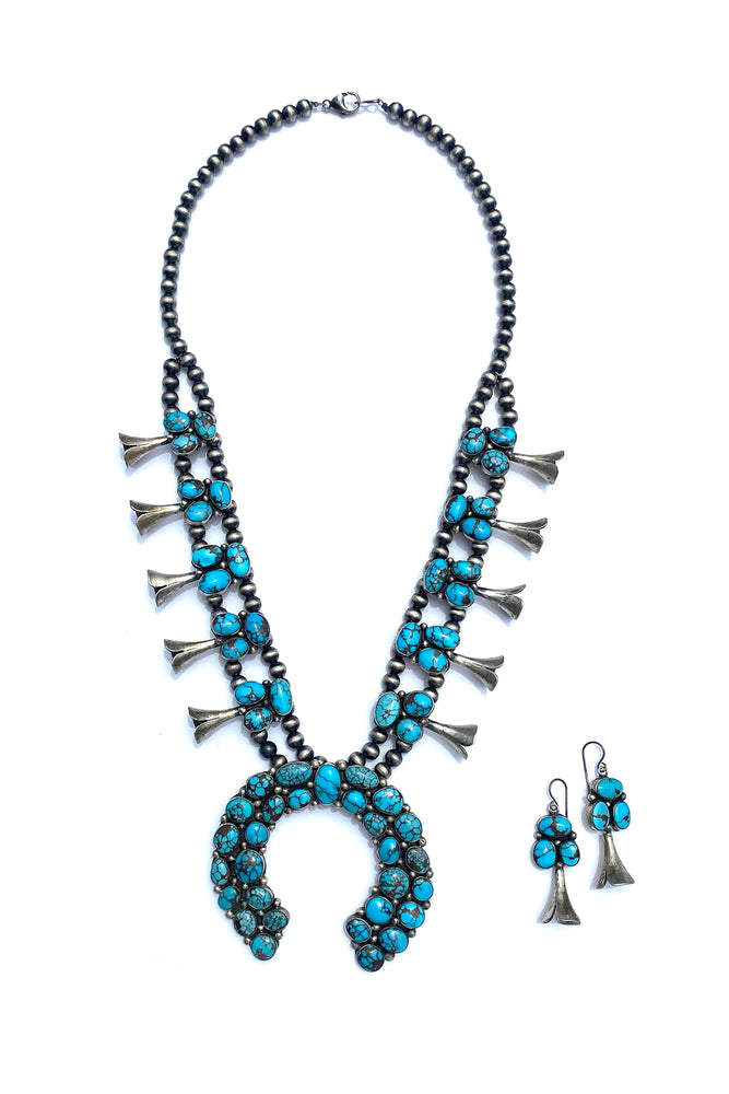 
                
                    Load image into Gallery viewer, Navajo Eleanor Largo Egyptian Turquoise Squash Blossom Necklace (Set)
                
            