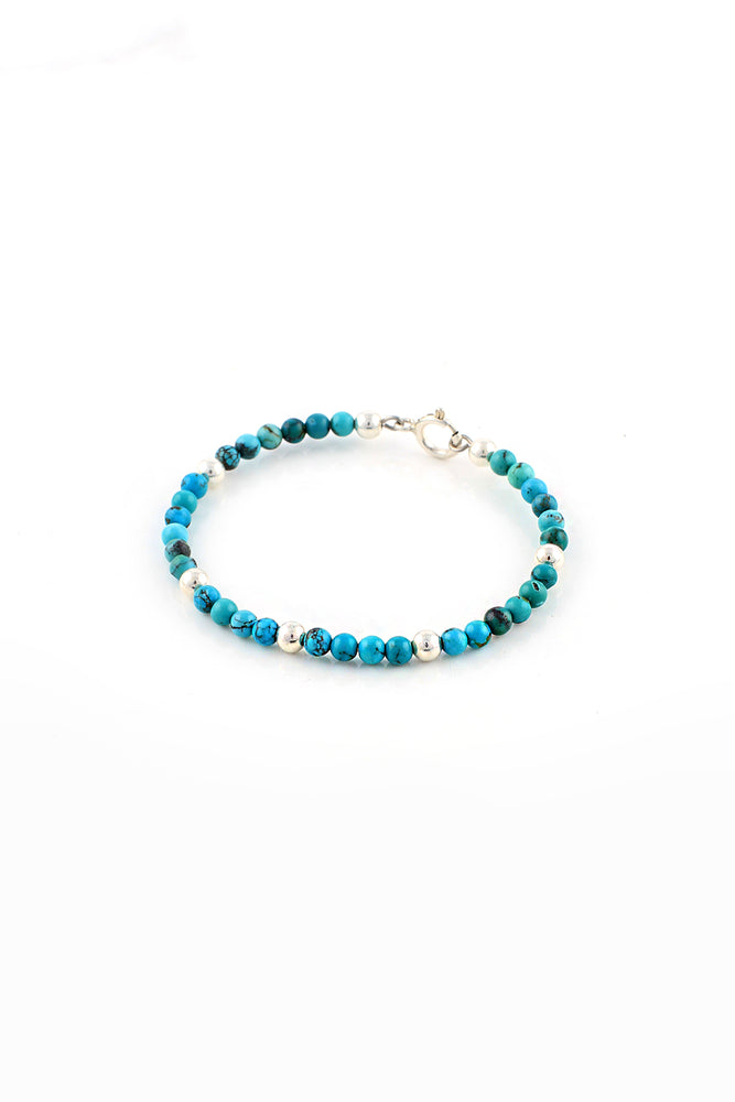 Child's Elasticated Bracelet with turquoise and silver beads
