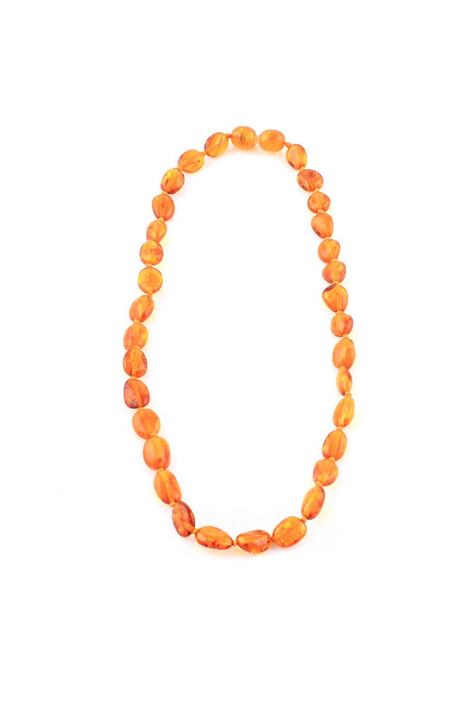 Butterscotch amber necklace, thirty-nine graduated oval beads, the smallest  bead measuring approx 6m