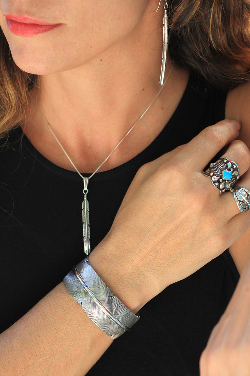 Slender Sterling Silver Feather Pendant