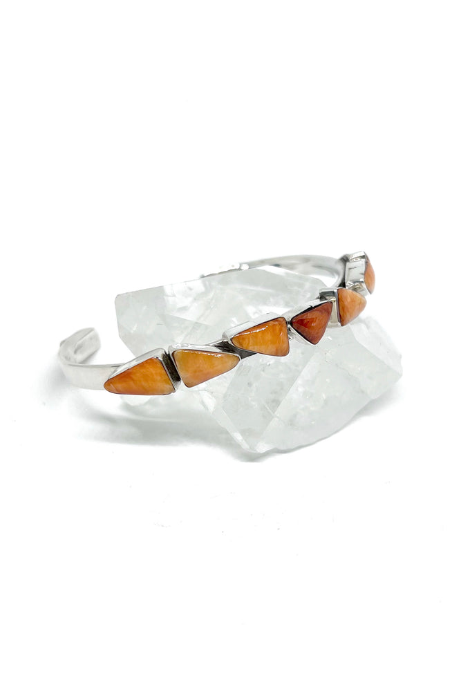 
                
                    Load image into Gallery viewer, Navajo Orange Spiny Shell Sterling Silver Row Cuff Bracelet
                
            